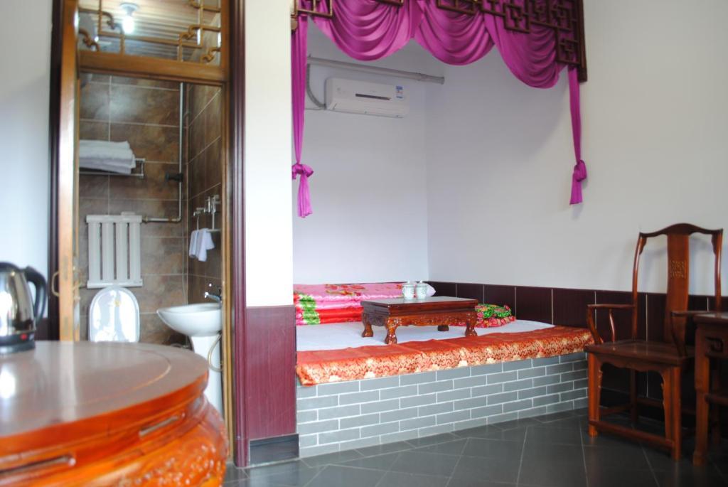 Pingyao Hong Jin Tai Fork Inn Part B Номер фото